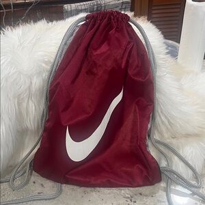 Nike Maroon Drawstring Backpack with White Swoosh